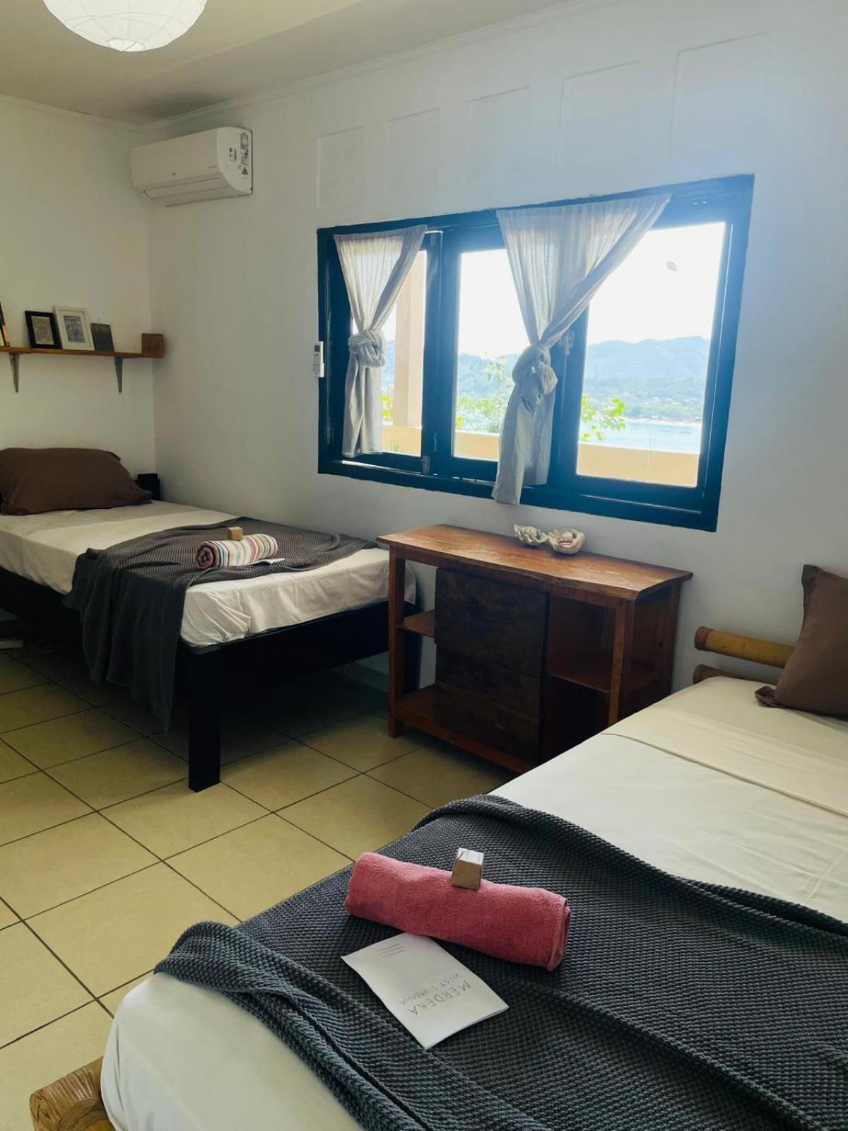 Merdeka House Maluk Habitación foto